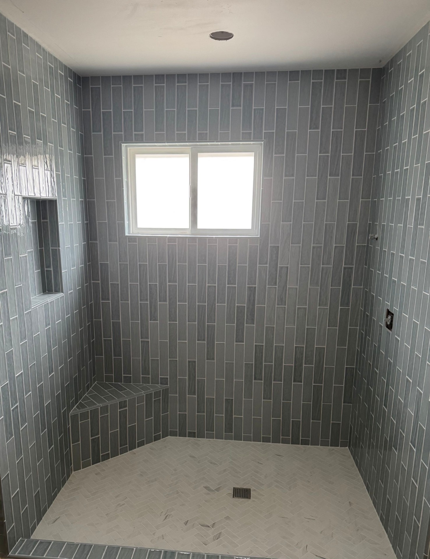 Custom vertical tile walk-in shower
